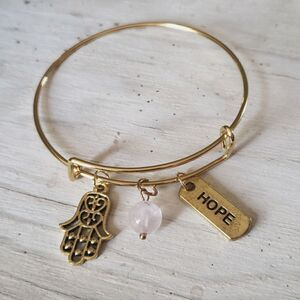 Bracelets by Sandra gold tone adjustable, Hope